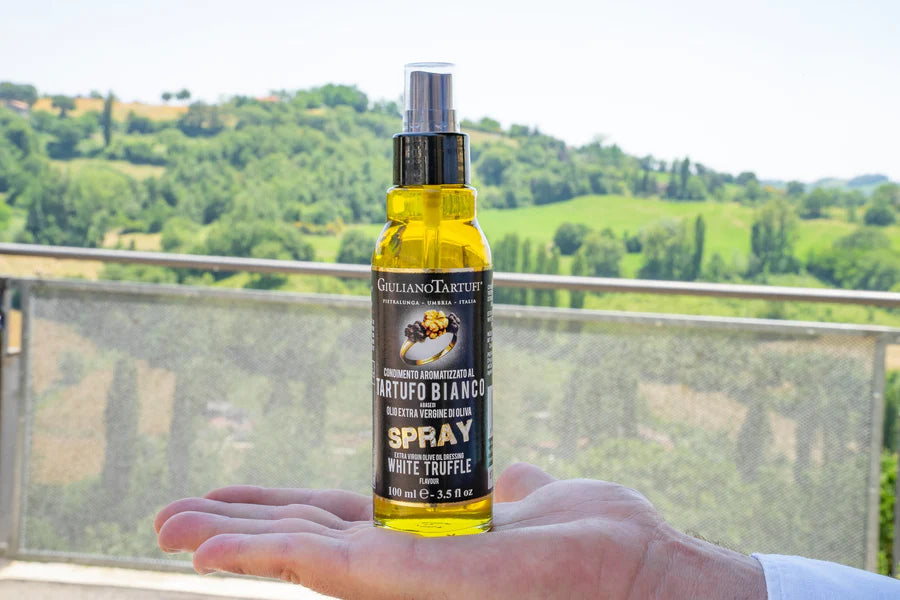 Extra virgin olive oil with white truffle in spray bottle 